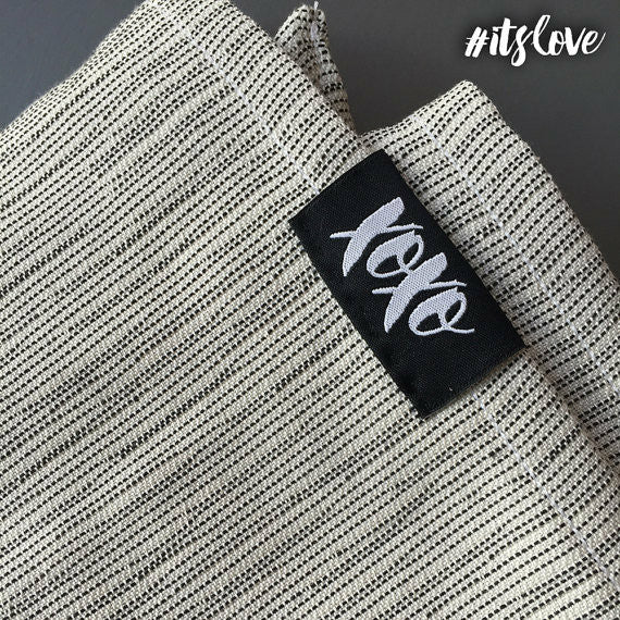 XOXO Buckle Wrap Carrier